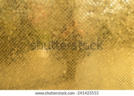Texure of rich golden mosaic close up