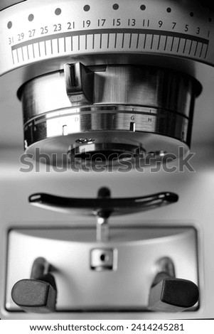 conical millstones of a coffee grinder with the possibility of stepless micrometric adjustment of the grinding of coffee beans Royalty-Free Stock Photo #2414245281