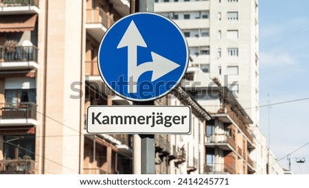 The picture shows a signpost and a sign that points in German in the direction of the exterminator.
