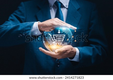 Businessman holding virtual globe with e-commerce icons of shopping for online shopping. Add to cart, internet store, buy online and e-commerce concept. Royalty-Free Stock Photo #2414271823