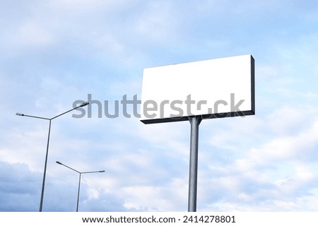 Outdoor billboard mockup on blue sky background 