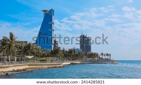 View of Jeddah skyscrapers from the public beach. Royalty-Free Stock Photo #2414285821