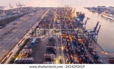 Shipyard industry shipping seafaring vessel at sunries. Cargo container depot port logistics transportation industry concept. Port operations for import export conmercial shipping to customs service