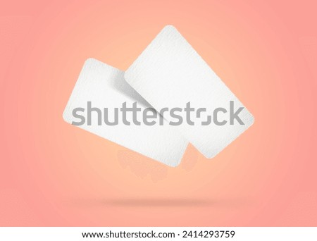 Blank business cards in air on coral color background. Mockup for design