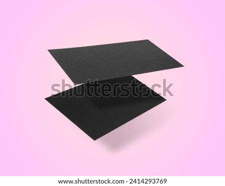 Blank business cards in air on pink background. Mockup for design