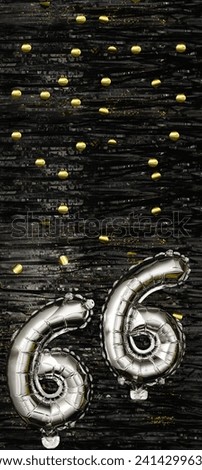 Silver foil balloon number 66 on a background of black tinsel with gold confetti. Birthday card, inscription sixty-sixth. Anniversary event. Vertical banner. copy space. Royalty-Free Stock Photo #2414299635