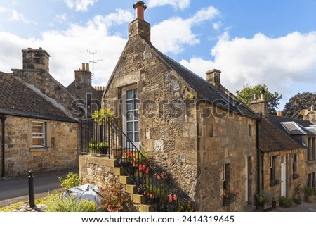 Old stone house in the historic village of Falkland in Scotland, home of Falkland Palace Royalty-Free Stock Photo #2414319645