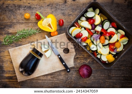 Preparing mediterranean oven vegetables stock photo