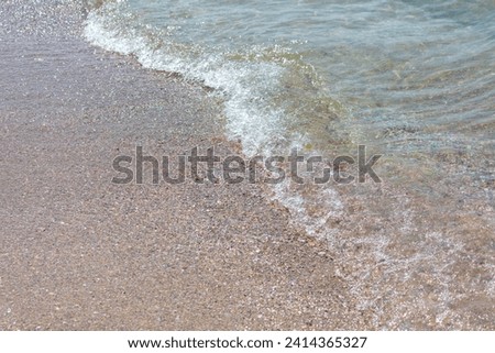 Water on the sandy seashore. Background.