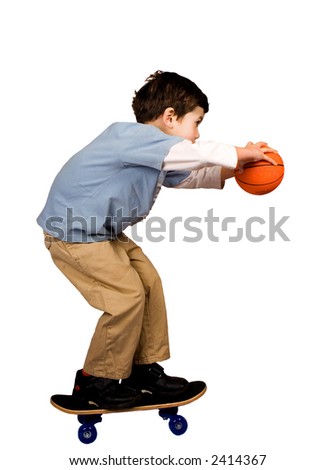 A boy poised to shoot a basketball in it's hoop, isolated on white.