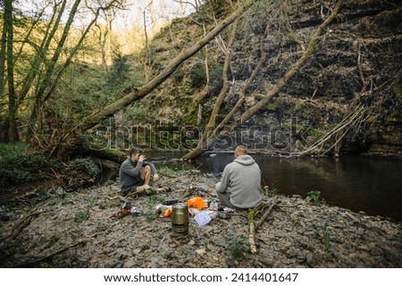 Young men grilling stock photo