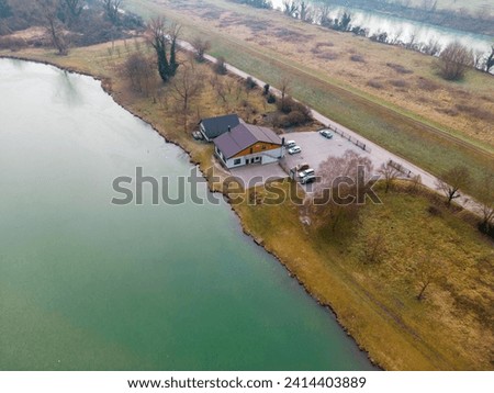 Drone view of Savica lakes, Croatia, close to the Sava river shore with fishing cabin for local fishermen visible in the picture