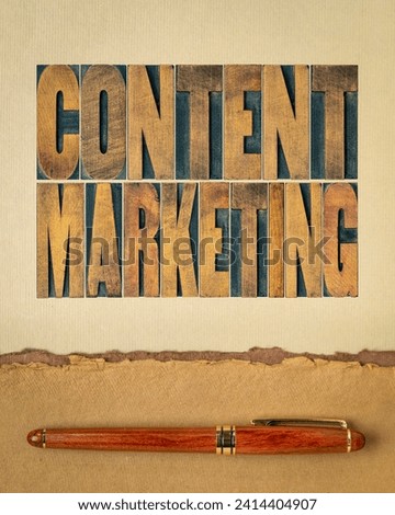 content marketing  - word abstract in vintage letterpress wood type printing blocks on art paper, business concept