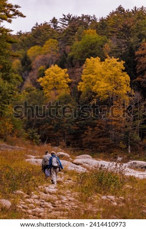 Photo of hikers in fall