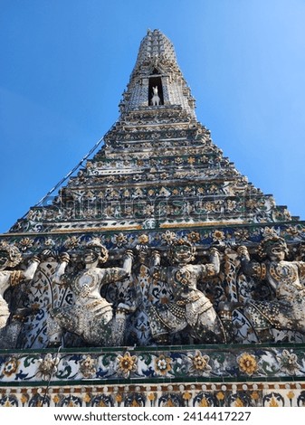 Wat Arun is one of the most famous landmarks in Bangkok. Located along the Chao Phraya River, it has the highest prang in Thailand. Royalty-Free Stock Photo #2414417227