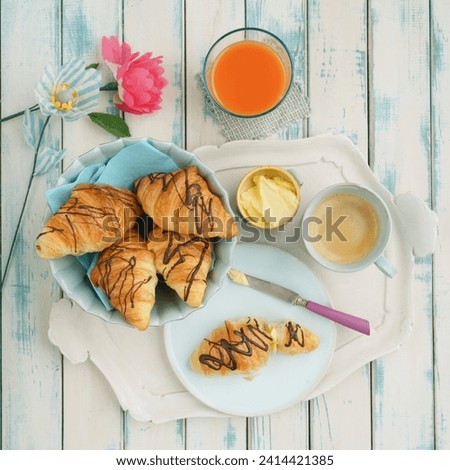 Breakfast with chocolate croissants stock photo