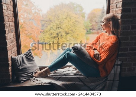 Full length profile photo of lovely carefree person sit barefoot window sill inspiration pastime calmness house inside