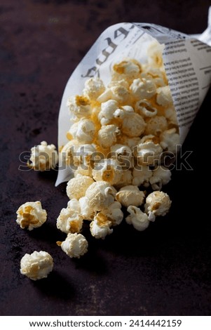 Paper bag of popcorn stock photo