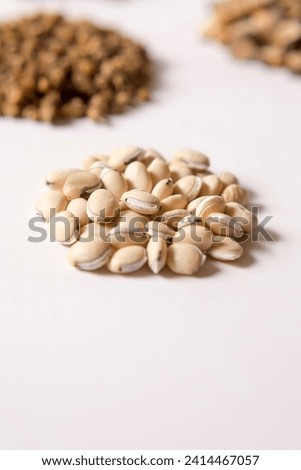 traditional Chinese medicine，Medications used to treat physical weakness.Chinese medicine on light background.Lentils.
