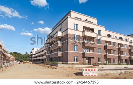 construction site of multi-storey residential buildings Royalty-Free Stock Photo #2414467195