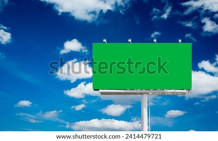 Green screen Empty billboard with chroma key on blue sky with clouds, advertisement concept, screen, green background, panoramic view