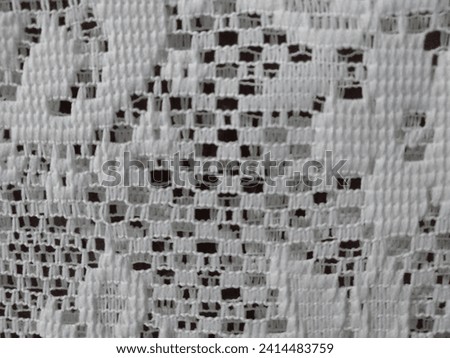 cloth background with a checkered motif