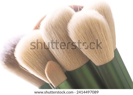 Macro bristles makeup brush,Brush tips in real-life color residue on bristles, isolated on white. Royalty-Free Stock Photo #2414497089