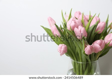 Beautiful pink tulips in a vase