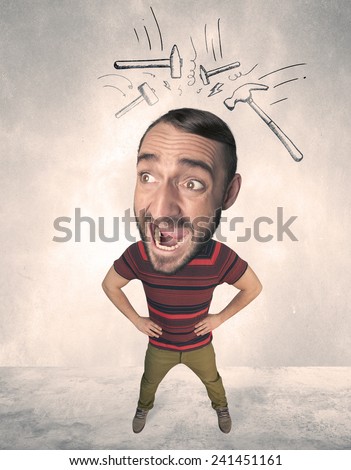 Funny person with big head and drawn punching hammers over it 