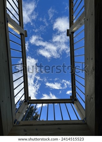 Cloud watching on a summer day. Royalty-Free Stock Photo #2414515523