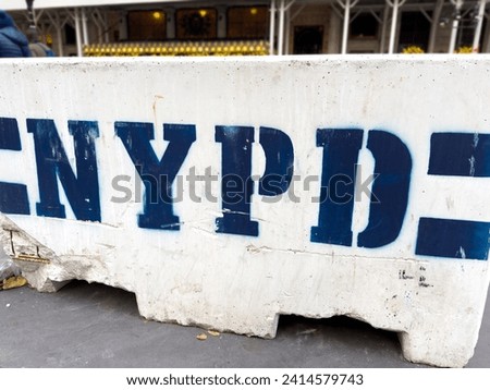 NYPD concrete road block on the sidewalk