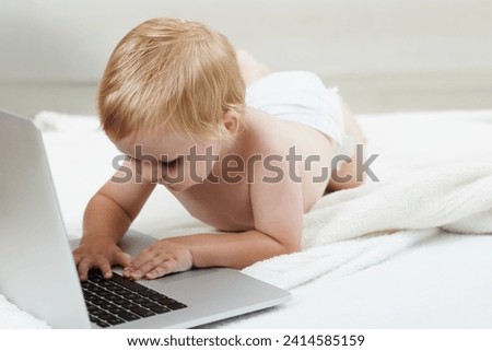 Baby, learning and playing on laptop in home with online games for education or elearning. Happy, child and relax with cartoon, movies or development of knowledge of technology for growth and fun