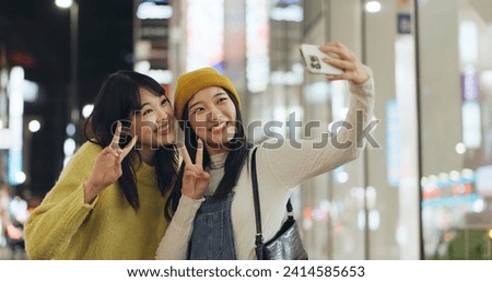 Friends, Japanese and selfie with women, happy and excited with adventure, profile picture and social media. People, smartphone or girls with night, fun and bonding together with pose and peace sign