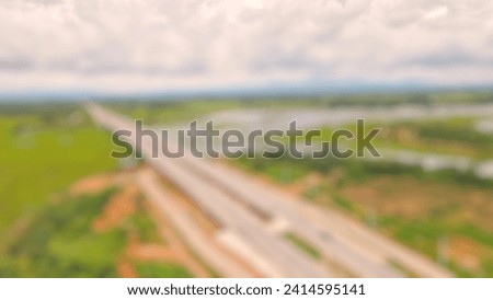 blurred picture of tress and highway:Use for website banner background,backdrop