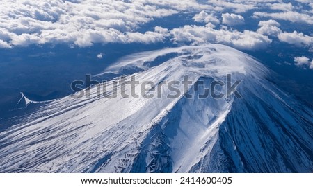 Aerial view of the Summit of Mount Fuji with snowcap. Royalty-Free Stock Photo #2414600405