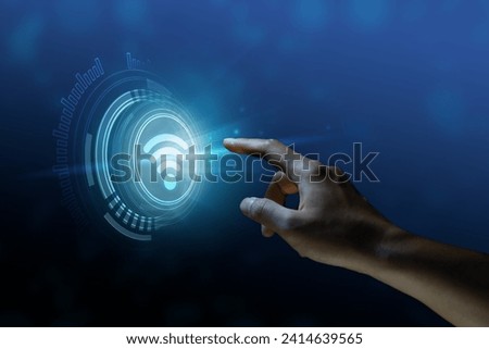 Wifi Wireless internet connection network technology concept. Hand pressing button on virtual screen.