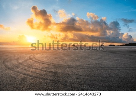 Asphalt road square and beautiful coastline nature landscape at sunrise