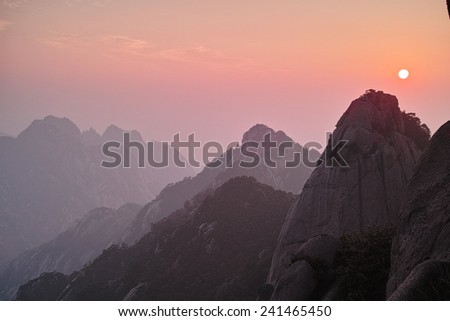 Sunset and sunrise in the mountains of Huangshan.