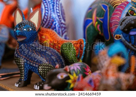Mexican folk art sculptures and souvenirs for sale in Mexico City, Mexico. Royalty-Free Stock Photo #2414669459