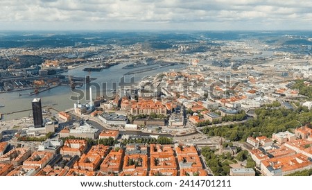 Gothenburg, Sweden. River Gota Alv and Rosenlund Canal. Panoramic view of the central part of the city. Summer day. Cloudy weather, Aerial View   Royalty-Free Stock Photo #2414701211
