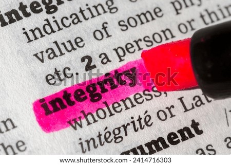 Integrity  Dictionary Definition highlighted with a pen