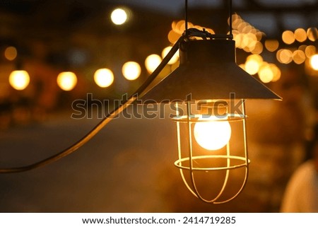  old fashioned lantern on night, vintage and camping style