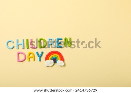 The inscription Children's Day on a light background