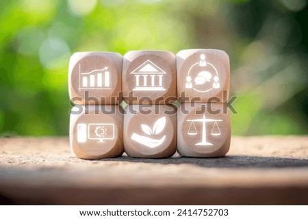 PESTEL analysis concept, political, economic, socio-cultural, technological, environmental and legal, Wooden block on desk with pestel icon on virtual screen. Royalty-Free Stock Photo #2414752703