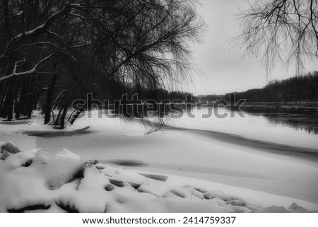 Winter Riverside Serenity: A Frosty Tale Along the Riverbanks
