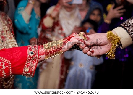 Pakistani bride groom holding hands and celebrating priceless moments