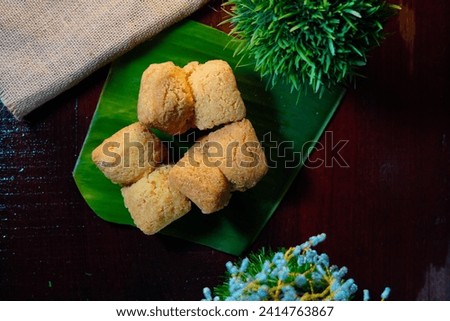 Vettu Cake Kerala Snacks Popular South Indian Snack Prepared by deep fry or baked filled with many Spices, Its a Tea Time Food and Traditional Food for all Festivals like Onam Vishu etc, Wooden 