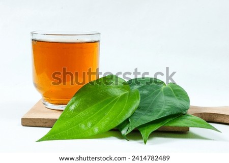 Betel leaf decoction. Betle leaf ( Daun Sirih ) boiled water has many properties such as antibacterial, anti-mutagenic, antioxidant, and anti-proliferative Royalty-Free Stock Photo #2414782489