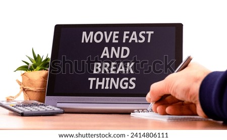 Move fast and break things symbol. Concept words Move fast and break things on beautiful black tablet. Businessman hand. Beautiful white background. Business move fast break things concept. Copy space