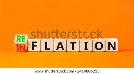 Reflation or inflation symbol. Concept word Reflation Inflation on beautiful wooden cubes. Beautiful orange table orange background. Business reflation inflation concept. Copy space
